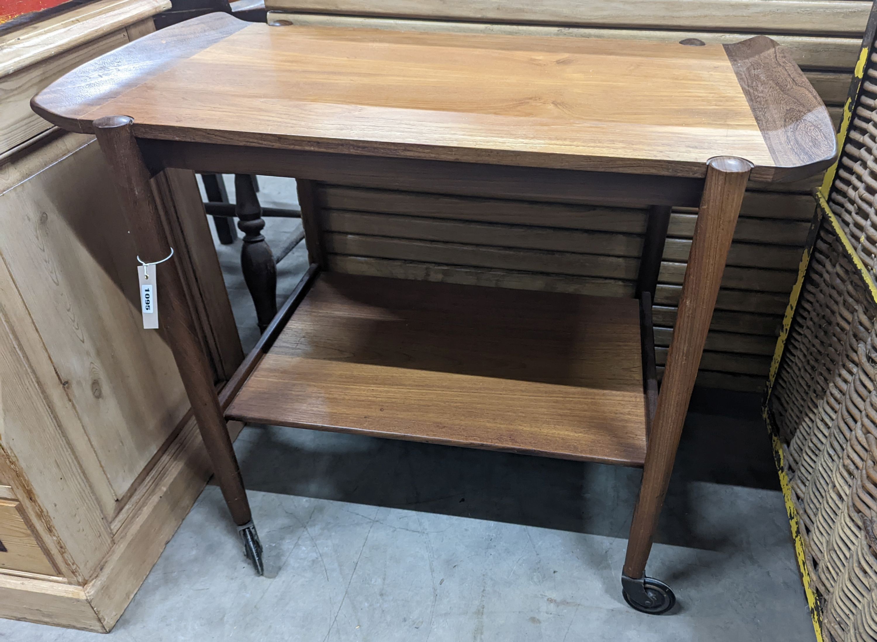 A mid century design teak two tier tea trolley, length 79cm, depth 46cm, height 70cm